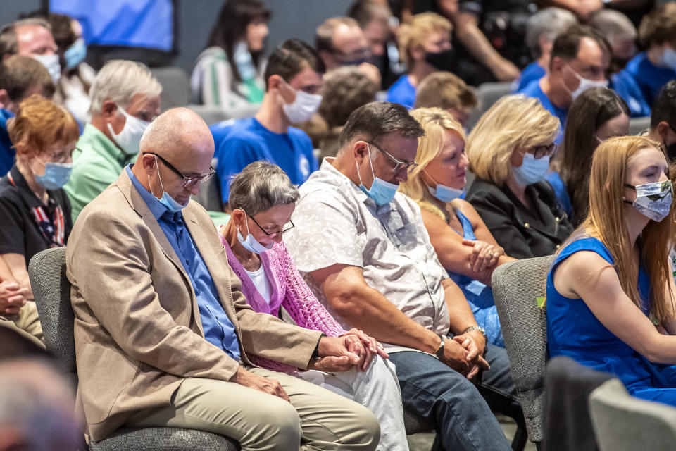 FILE—In this file photo from Sept. 9, 2020, people attending an event with Vice President Mike Pence, pray before he took the stage to speak to Marjorie Dannenfelser, president of the Susan B. Anthony List, an anti-abortion group, at Cornerstone Ministries church, in Export, Pa. a Pittsburgh suburb. Trump's selection of Mike Pence to be his vice president has often been cited as a turning point in getting evangelicals, who make up about 1 in 5 voters, to rally behind Trump four years ago. (Alexandra Wimley/Pittsburgh Post-Gazette via AP, File)