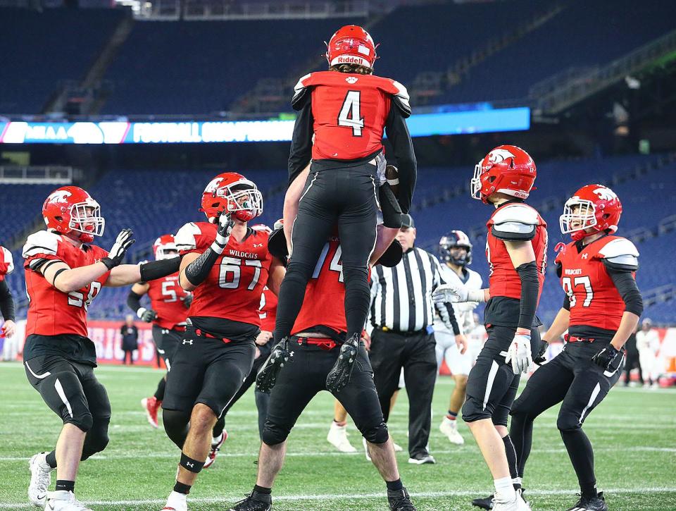 The O-Line celebrates a Ronan Sammon TD for Milton. The Milton Wildcats and Walpole Timberwolves faced off in the Div 3 MIAA Super Bowl at Gillette Stadium on Thursday, Nov. 30, 2023.
