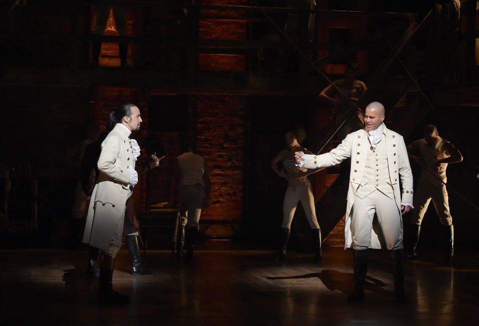 NEW YORK, NY - FEBRUARY 15:  Lin-Manuel Miranda (L) and Christopher Jackson (R) perform on stage during 'Hamilton' GRAMMY performance for The 58th GRAMMY Awards at Richard Rodgers Theater on February 15, 2016 in New York City.  (Photo by Theo Wargo/WireImage)