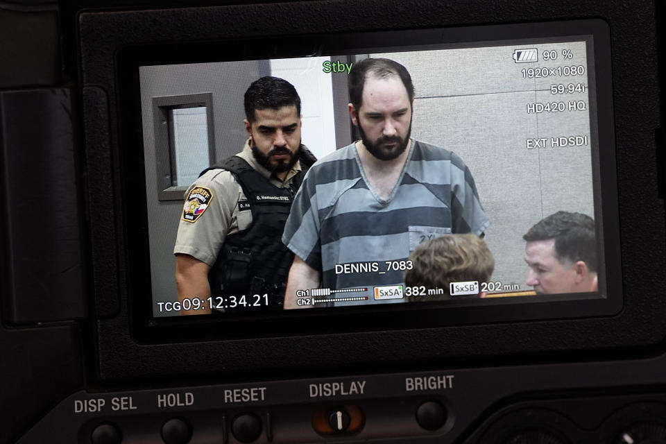 U.S. Army Sgt. Daniel Perry, who was convicted of murder for fatally shooting an armed protester in 2020 during nationwide protests against police violence and racial injustice, is seen on a pool video feed as he arrives for his sentencing hearing in Austin, Texas, Tuesday, May 9, 2023. (AP Photo/Eric Gay)