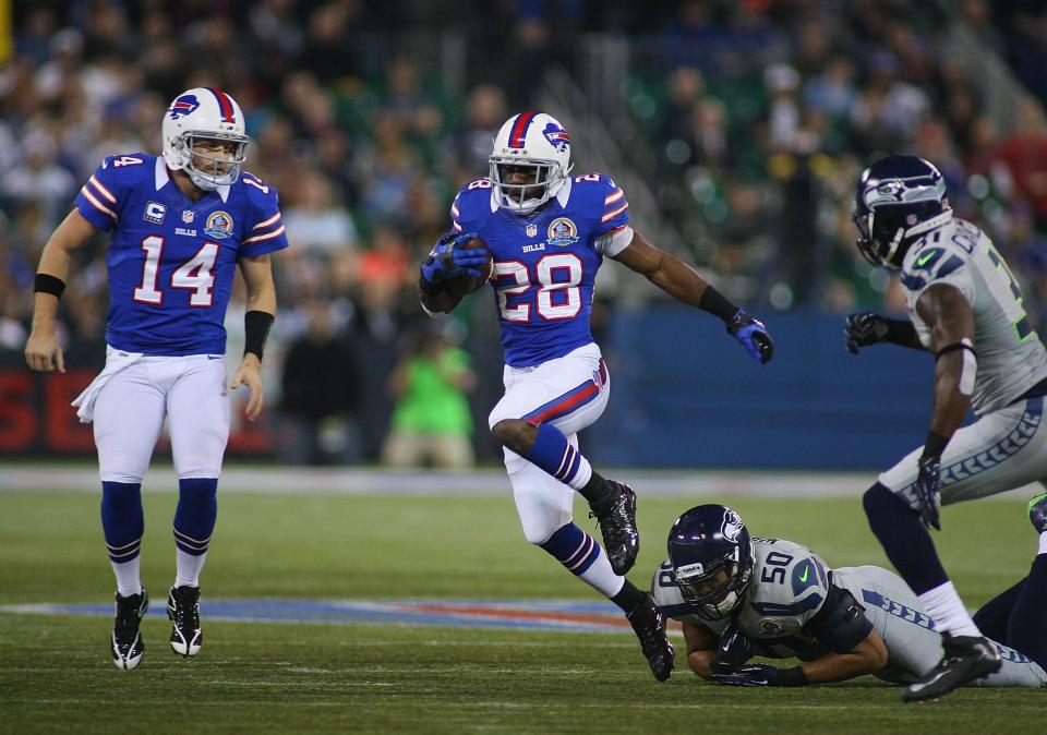 TORONTO, ON - DECEMBER 16: C.J. Spiller #28 of the Buffalo Bills runs against the Seattle Seahawks at Rogers Centre on December 16, 2012 in Toronto, Ontario, Canada. Seattle won 50-17. (Photo by Rick Stewart/Getty Images)