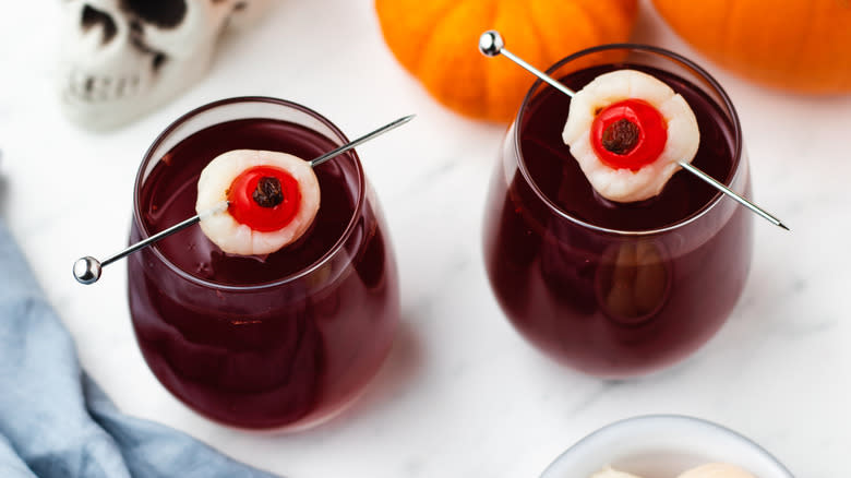 Two beetroot cocktails with edible eyeballs