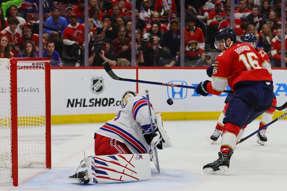 May 28, 2024; Sunrise, Florida, USA;New York Rangers goaltender Igor Shesterkin (31) makes a save against Florida Panthers center Aleksander Barkov (16) during the second period in game four of the Eastern Conference Final of the 2024 Stanley Cup Playoffs at Amerant Bank Arena. Mandatory Credit: Sam Navarro-USA TODAY Sports