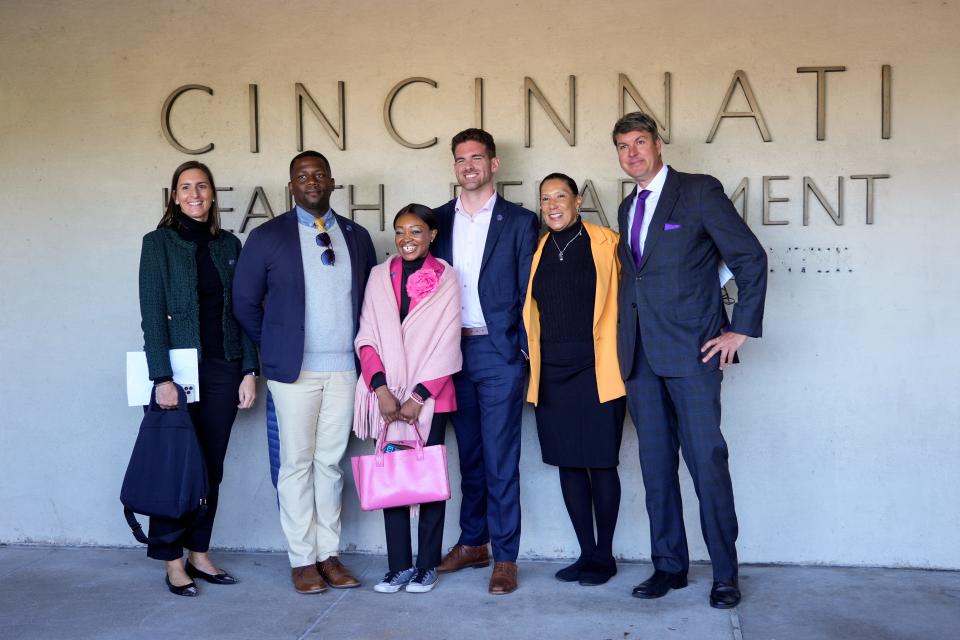 Council members tour Cincinnati, assessing maintenance needs. Keating, a Republican, rode along with with her colleagues, who are Democrats. Fom left: Keating with Reggie Harris, Meeka Owens, Seth Walsh, Jan-Michele Lemon Kearney and Jeff Cramerding.