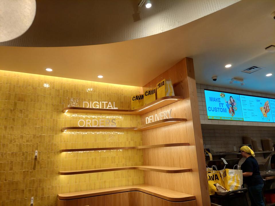 The empty digital orders and delivery shelves at the Cava restaurant in Chicago