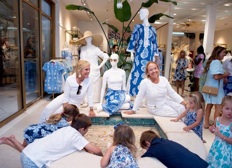 Sisters Liza, left, and Minnie Pulitzer, surrounded by grandchildren, celebrate the launch of their Barefoot in Paradise at Lilly Pulitzer Worth Avenue April 30, 2024 in Palm Beach.