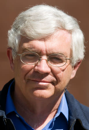 FILE PHOTO: Stanford Economics Professor John B. Taylor speaks with Reuters journalists at the Jackson Hole Economic Symposium in Jackson Hole, Wyoming August 21, 2009. Picture taken August 21, 2009. REUTERS/Price Chambers/File Photo