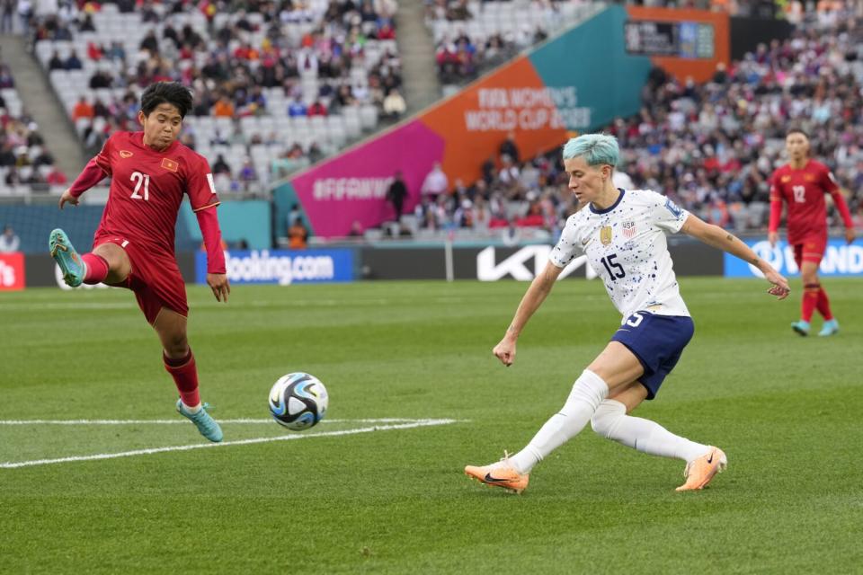 United States' Megan Rapinoe plays the ball as Vietnam's Thi Van Su Ngan defends.