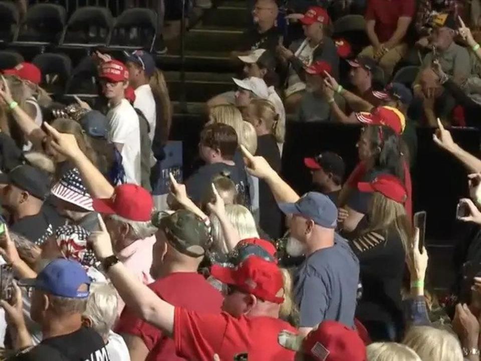 Trump fans a give one-fingered salute at a Trump rally in Youngstown, Ohio (Screenshot / Newsmax / Twitter / Aaron Rupar)