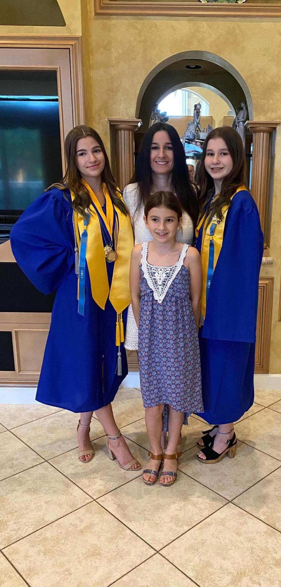 Dr. Vivian Hernandez-Trujillo, director of allergy/immunology at Nicklaus Children’s Hospital, is shown with her three daughters l-r, Sophia, 14; Olivia, 10, and Bella Whitcomb, 14. Hernandez-Trujillo developed a peanut allergy as an adult. Sophia and Olivia both have peanut allergies but Sophia’s twin Bella does not.