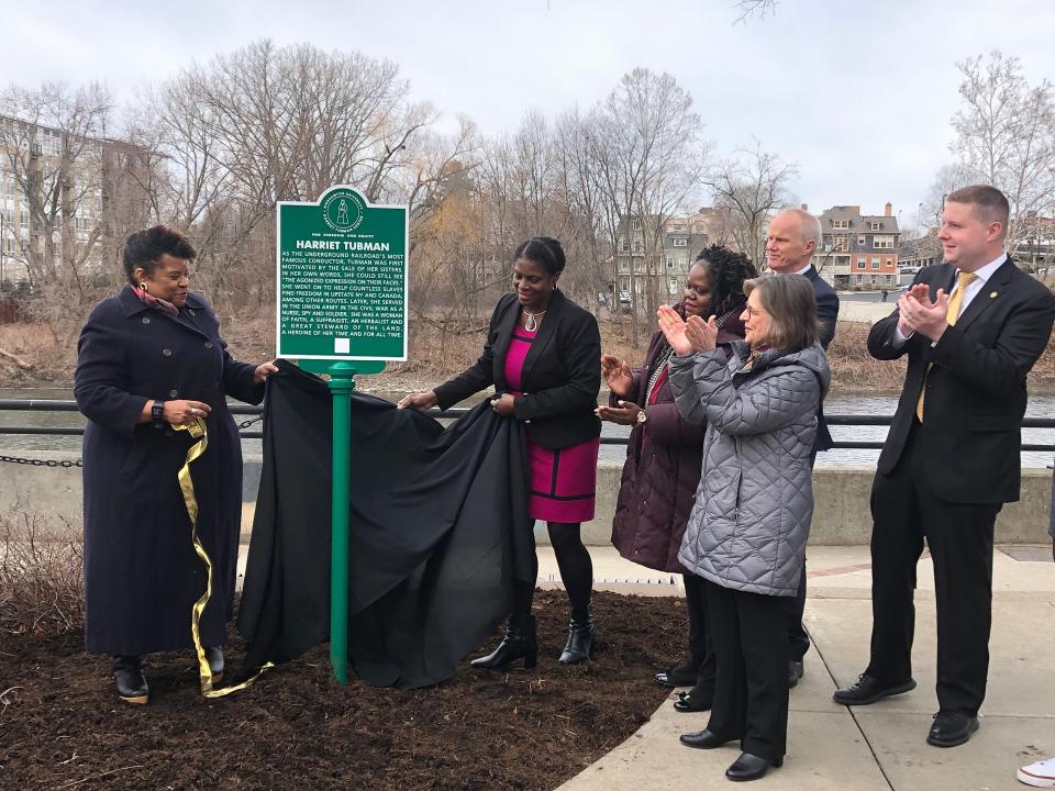 Anne Bailey and Dr. Sharon Bryant, directors of Binghamton University's Harriet Tubman Center of Freedom and Equity, unveiled the first of 13 markers to be displayed across Binghamton on Friday, March 10, 2023.