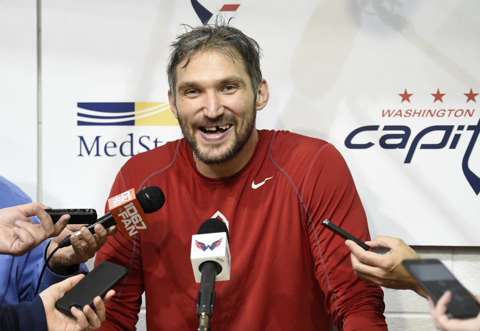 FILE – In this Sept. 14, 2018, file photo, Washington Capitals’ Alex Ovechkin, of Russia, laughs as he talks to the media at NHL hockey training camp, in Arlington, Va. Coming off scoring an NHL-best 49 goals and winning the Conn Smythe Trophy as playoff MVP, Ovechkin has nothing left to prove as one of the best players of this generation. (AP Photo/Nick Wass, File)