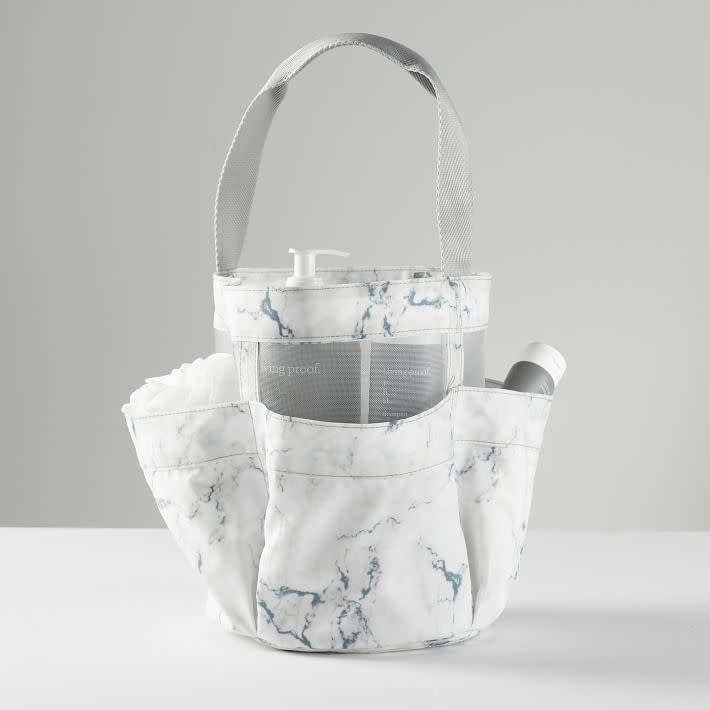 <p><a href="https://go.redirectingat.com?id=74968X1596630&url=https%3A%2F%2Fwww.pbteen.com%2Fproducts%2Frecycled-classic-shower-caddies%2F%3FcatalogId%3D21%26sku%3D8472707%26cm_ven%3DPLA&sref=https%3A%2F%2Fwww.housebeautiful.com%2Flifestyle%2Forganizing-tips%2Fg28065212%2Fdorm-room-storage-ideas%2F" rel="nofollow noopener" target="_blank" data-ylk="slk:Shop Now;elm:context_link;itc:0;sec:content-canvas" class="link rapid-noclick-resp">Shop Now</a></p><p>Recycled Classic Shower Caddies</p><p>$29.00</p><p>pbteen.com</p><span class="copyright">PBTeen</span>