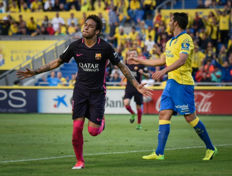 Barcelona's forward Neymar celebrates his second goal against Las Palmas on May 14, 2017