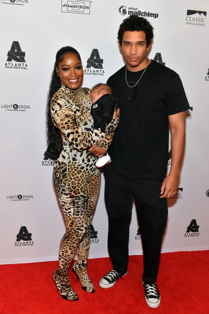 Keke Palmer holds son Leodis as they and Darius Jackson attend the “Big Boss” closing night screening during the Atlanta Film Festival in April. The public sensed trouble between the couple in July after she attended an Usher concert and he seemingly reprimanded her for her attire there. (Photo by Paras Griffin/Getty Images)
