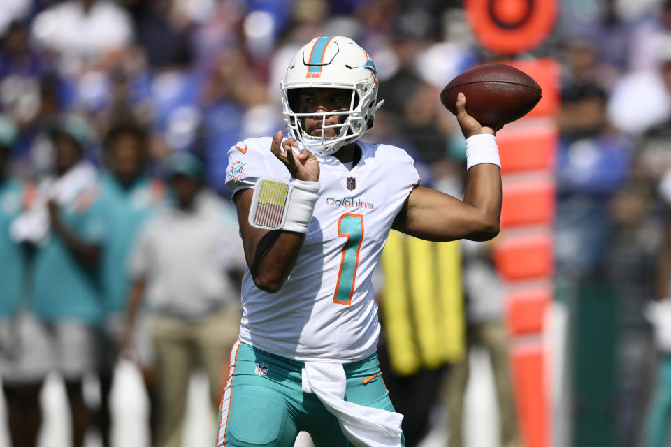 Miami Dolphins quarterback Tua Tagovailoa (1) aims a pass during the first half of an NFL football game against the Baltimore Ravens, Sunday, Sept. 18, 2022, in Baltimore. (AP Photo/Nick Wass)