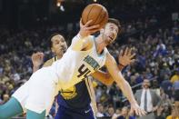March 31, 2019; Oakland, CA, USA; Charlotte Hornets forward Frank Kaminsky (44) shoots the basketball against Golden State Warriors guard Shaun Livingston (34) during the second quarter at Oracle Arena. Mandatory Credit: Kyle Terada-USA TODAY Sports