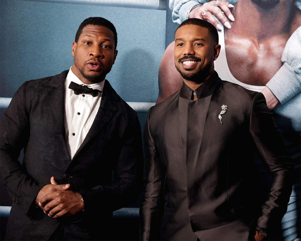 Jonathan Majors and Michael B. Jordan attend the Los Angeles Premiere of CREED III at TCL Chinese Theatre on February 27, 2023 in Hollywood, California.