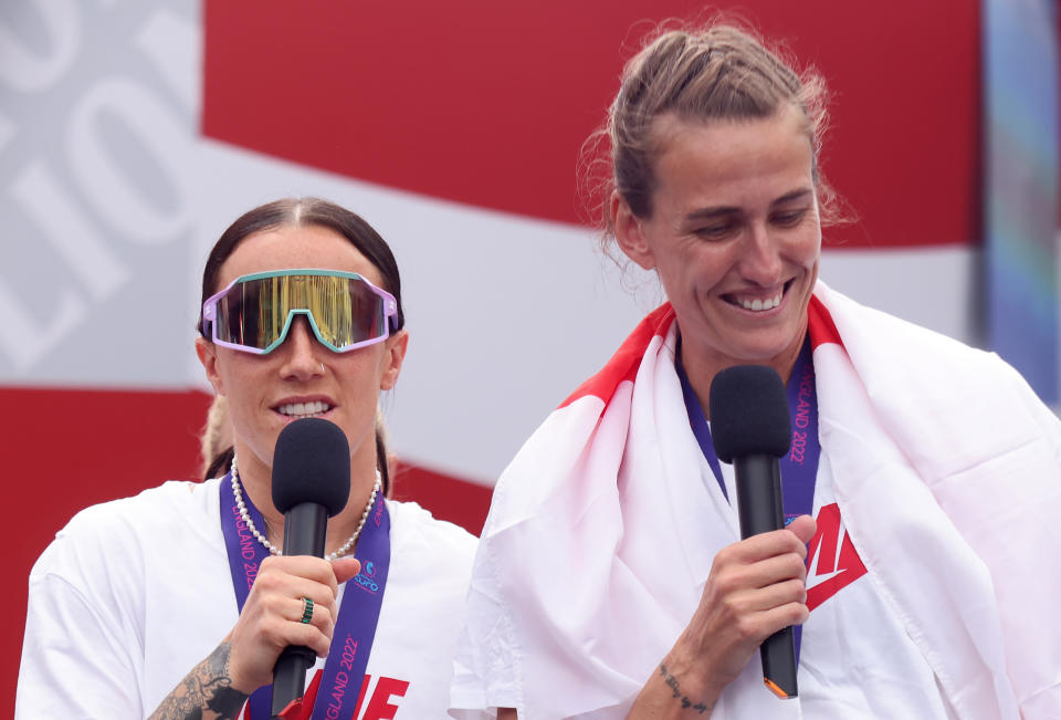 England's Lucy Bronze and Jill Scott on stage during a fan celebration to commemorate England's historic UEFA Women's EURO 2022 triumph in Trafalgar Square, London. Picture date: Monday August 1, 2022.