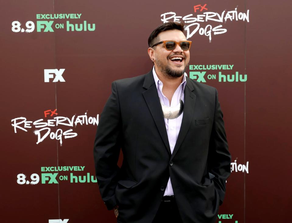 Oklahoma filmmaker Sterlin Harjo is shown in 2021 outside the Circle Cinema in Tulsa for the premiere of "Reservation Dogs."