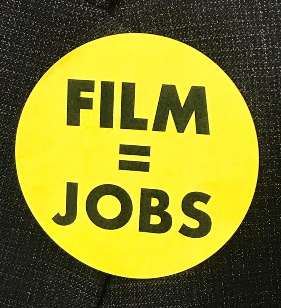 Supporters of the Louisiana film tax credit program wore  lapel stickers showing their support in a House Ways and Means Committee hearing Monday, May 24, 2021.