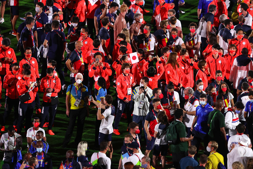 TOKYO, JAPAN - AUGUST 08: Members of Team Japan celebrate during the Closing Ceremony of the Tokyo 2020 Olympic Games at Olympic Stadium on August 08, 2021 in Tokyo, Japan. (Photo by Francois Nel/Getty Images)