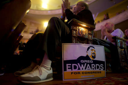 FILE PHOTO: Supporters clap as U.S. Senator Bernie Sanders campaigns for Democrat Greg Edwards, Pennsylvania's 7th District Congressional candidate, during a rally in Allentown, Pennsylvania, U.S. May 5, 2018. Picture taken May 5, 2018. REUTERS/Mark Makela