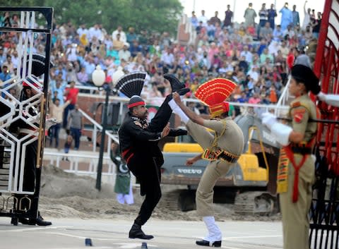 The Wagah border ceremony is quite the spectacle - Credit: AFP/SUJIT JAISWAL