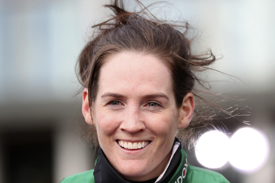 Rachael Blackmore talks to journalists after winning the Randox Grand National Handicap Chase ridding Minella Times on the third day of the Grand National Horse Racing meeting at Aintree racecourse, near Liverpool, England, Saturday April 10, 2021. (AP Photo/Scott Heppell, Pool)