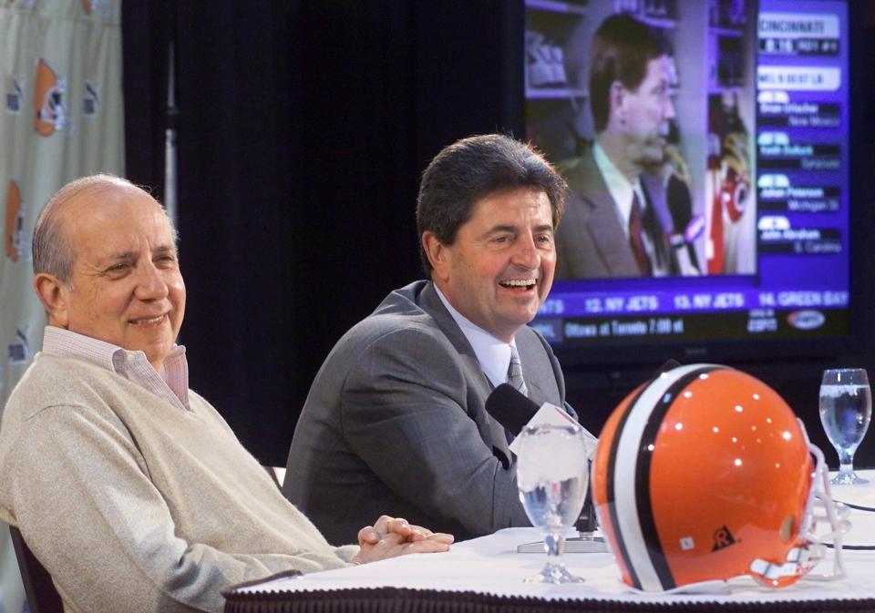 Cleveland Browns owner Al Lerner, left, and team president Carmen Policy answer questions at the team's Berea headquarters after taking Penn State defensive tackle Courtney Brown with the first pick in the 2000 NFL draft Saturday, April 15, 2000. (AP Photo/Mark Duncan)