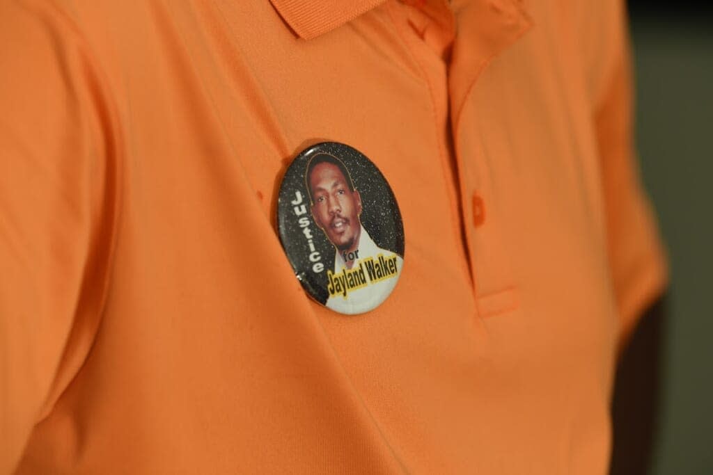 Pastor Robert DeJournett wears a “Justice for Jayland” button. (Photo credit: Ken Love Photography)