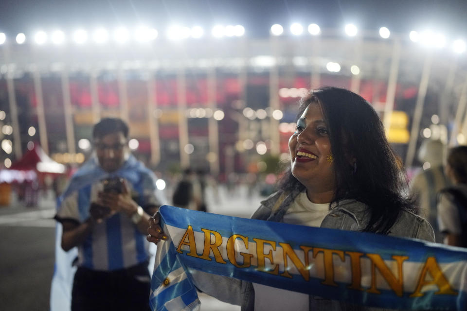 FILE - An Argentina soccer fan from India waits outside before the World Cup group C soccer match between Poland and Argentina at the Stadium 974 in Doha, Qatar, Wednesday, Nov. 30, 2022. (AP Photo/Natacha Pisarenko, File)