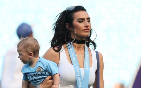 Annie Killner with her and Kyle Walker's two-year-old son - Credit: Getty