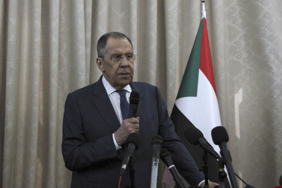 Russian Foreign Minister Sergei Lavrov and Sudanese acting foreign minister Ali al-Sadiq (not seen) give a joint press conference at the airport in Khartoum, Sudan, Thursday, Feb. 9, 2023. (AP Photo/Marwan Ali)