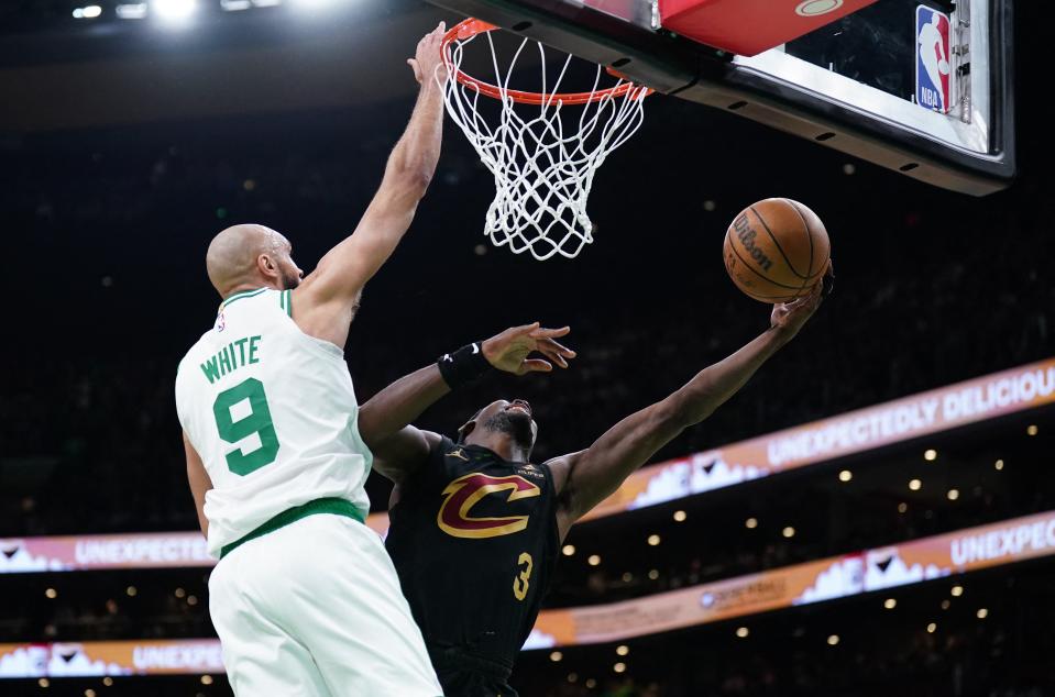 Cavaliers guard Caris LeVert shoots against Celtics guard Derrick White in the first quarter during Game 2 of the Eastern Conference semifinals, May 9, 2024, in Boston.
