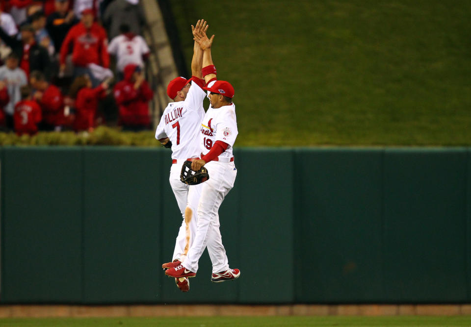 Matt Holliday #7 and Jon Jay #19 of the St. Louis Cardinals celebrate after the Cardinals 12-4 victory against the Washington Nationals during Game Two of the National League Division Series at Busch Stadium on October 8, 2012 in St Louis, Missouri. (Photo by Dilip Vishwanat/Getty Images)