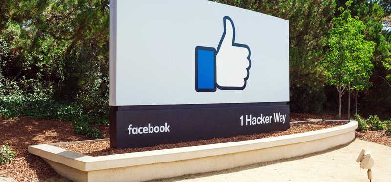 A facebook like thumbs up on a sign.