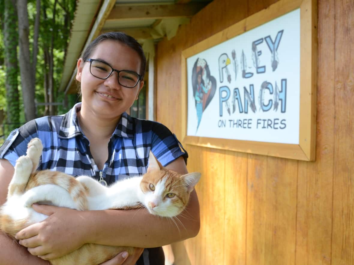 Sixteen-year-old Zhawanoogbiik Danielle Riley opened an animal food bank in Chippewas of the Thames near St. Thomas, Ont., after noticing a growing need for pet food and animal care. She's a semifinalist in the Pow Wow Pitch competition from more than 2,400 applicants across North America.  (Michelle Both/CBC - image credit)