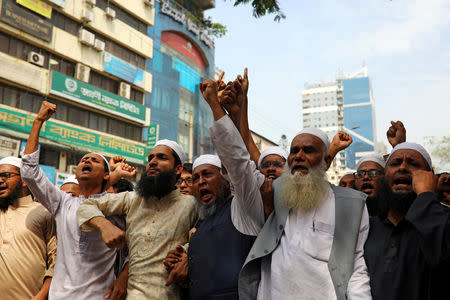 Muslims shout slogan as they condemn Christchurch mosque attack in New Zealand, after Friday prayers at the Baitul Mukarram National Mosque in Dhaka, Bangladesh, March 15, 2019. REUTERS/Mohammad Ponir Hossain