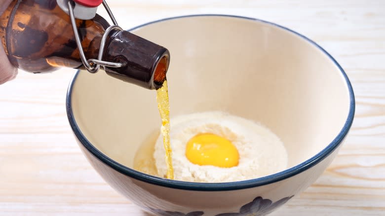 pouring beer into batter bowl