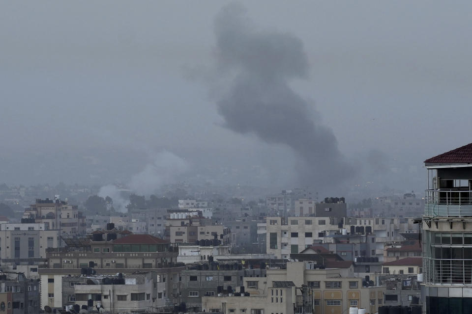 Smoke rises after Israeli airstrikes on Hamas military camp in Gaza City, Wednesday, April 5, 2023. Israeli police stormed into the Al-Aqsa Mosque in Jerusalem's Old City early Wednesday, firing stun grenades at Palestinian youths who hurled firecrackers at them in a burst of violence during a sensitive holiday season. Gaza militants responded with rocket fire on southern Israel, prompting repeated Israeli airstrikes.(AP Photo/Adel Hana)