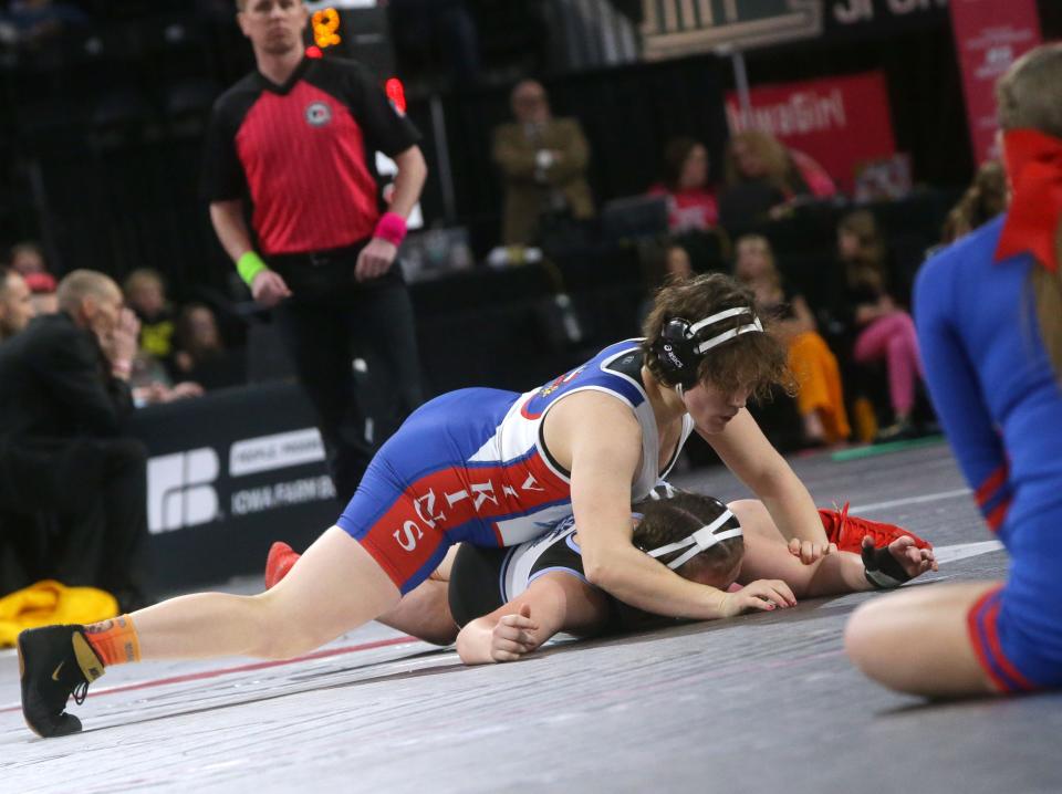 Decorah’s Naomi Simon wrestles South Tama County’s Autumn Elsbury in the 170-pound final on Friday at the state wrestling tournament in Coralville. Simon won 12-2 to become Iowa's first four-time girls state champion.