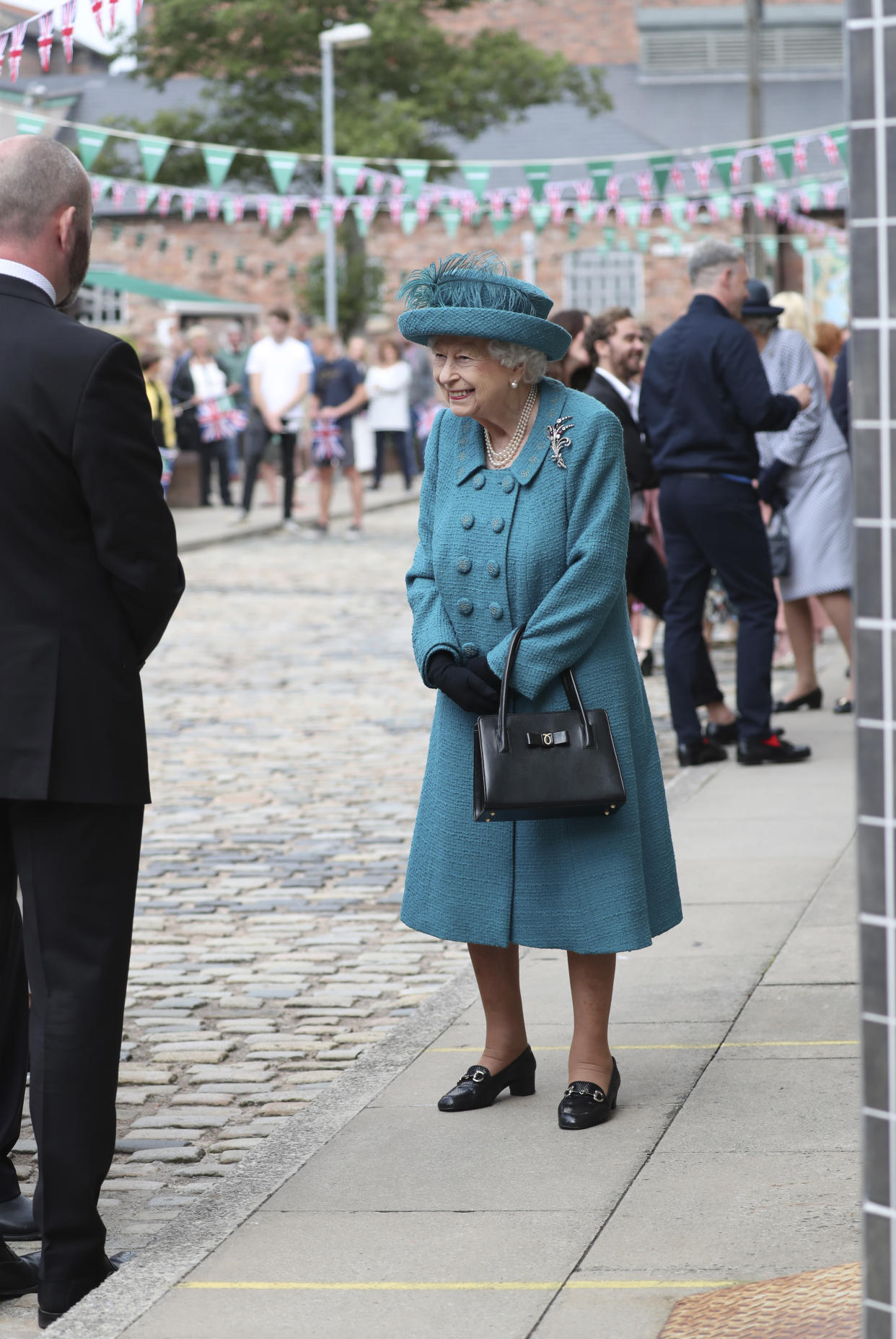 Queen Elizabeth II during a visit to the set of Coronation Street at the ITV Studios, Media City UK, Manchester. Picture date: Thursday July 8, 2021.