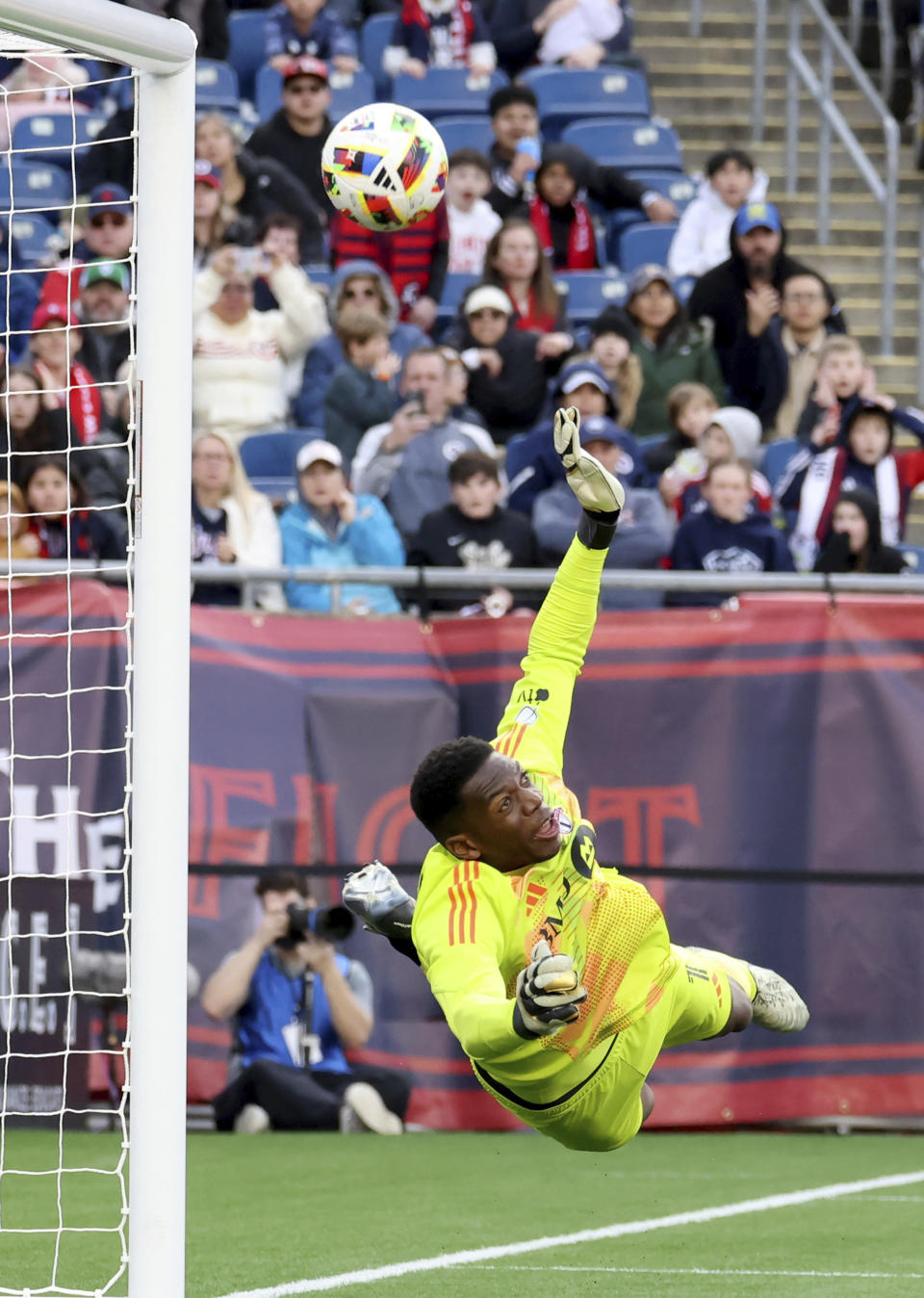 Toronto FC goalkeeper Sean Johnson (1) defends the net in the second half of an MLS soccer match against New England Revolution, Sunday, March 3, 2024, in Foxborough, Mass. (AP Photo/Mark Stockwell)