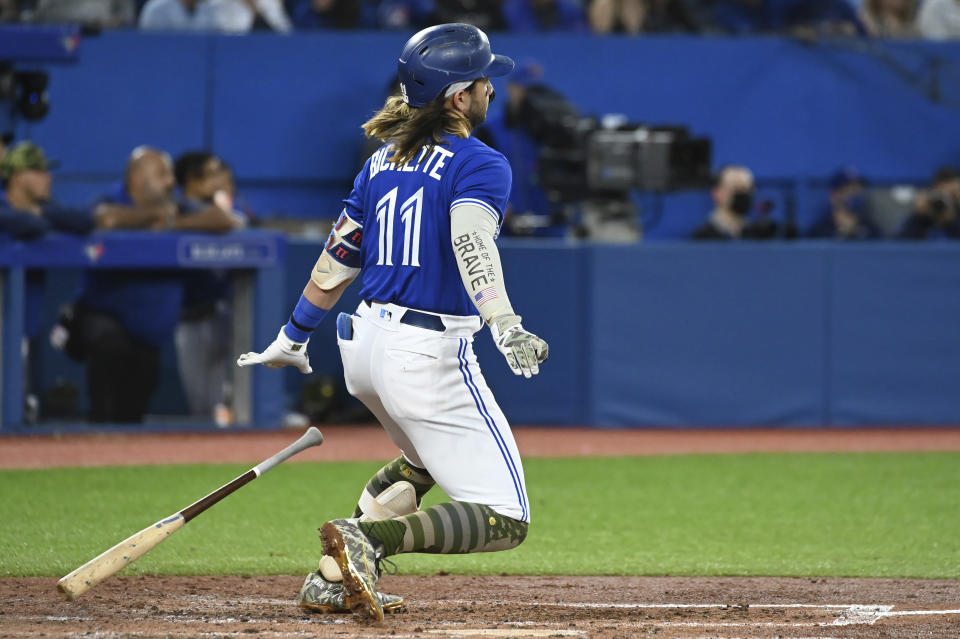 Toronto Blue Jays' Bo Bichette watches his RBI double against the Cincinnati Reds during the fifth inning of a baseball game Friday, May 20, 2022, in Toronto. (Jon Blacker/The Canadian Press via AP)