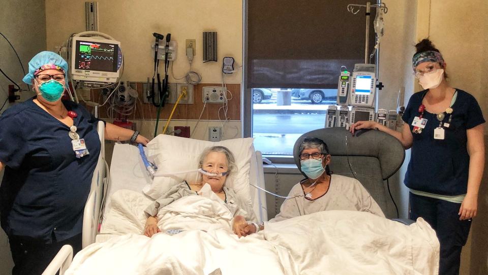 Nurses Kim Presson, left,  and Hannah Schlemer helped reunite Masako and Frank Martinez for a dinner date.