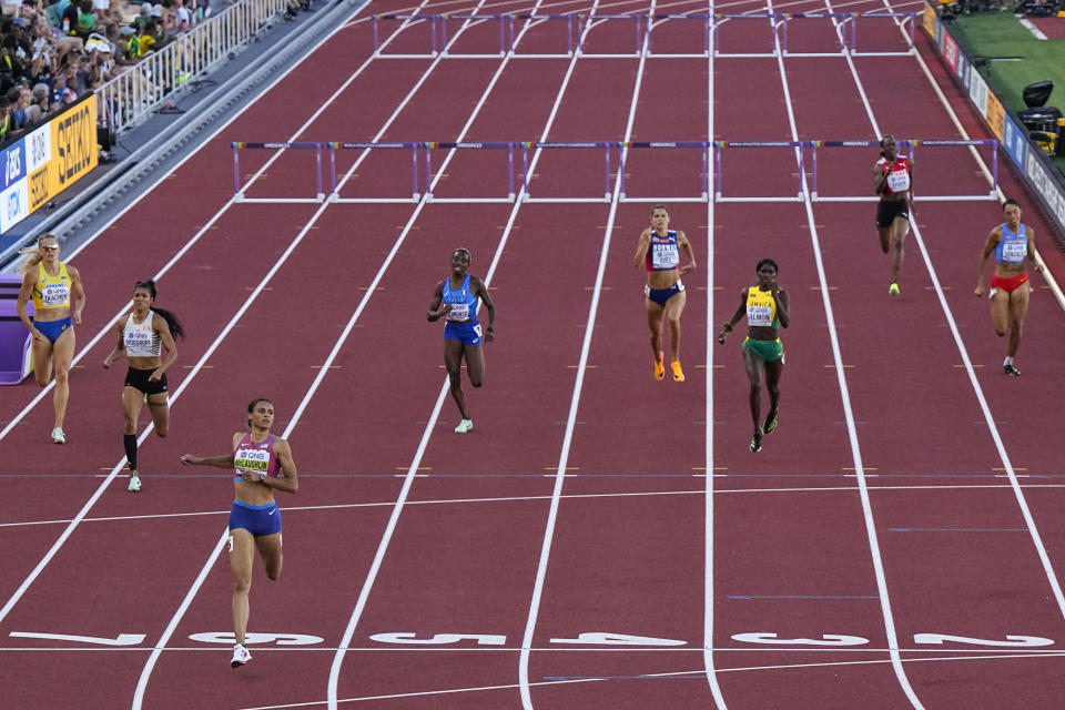 Sydney Mclaughlin, of the United States, wins in the semifinal of the women's 400-meter hurdles at the World Athletics Championships on Wednesday, July 20, 2022, in Eugene, Ore. (AP Photo/Ashley Landis)