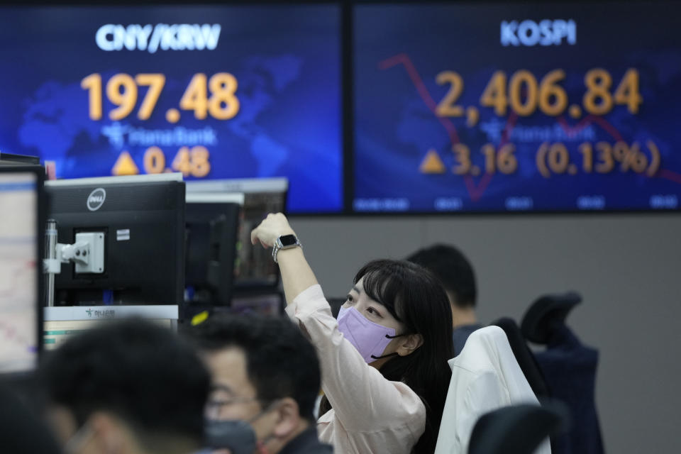 A currency trader watches monitors at the foreign exchange dealing room of the KEB Hana Bank headquarters in Seoul, South Korea, Tuesday, Sept. 6, 2022. (AP Photo/Ahn Young-joon)