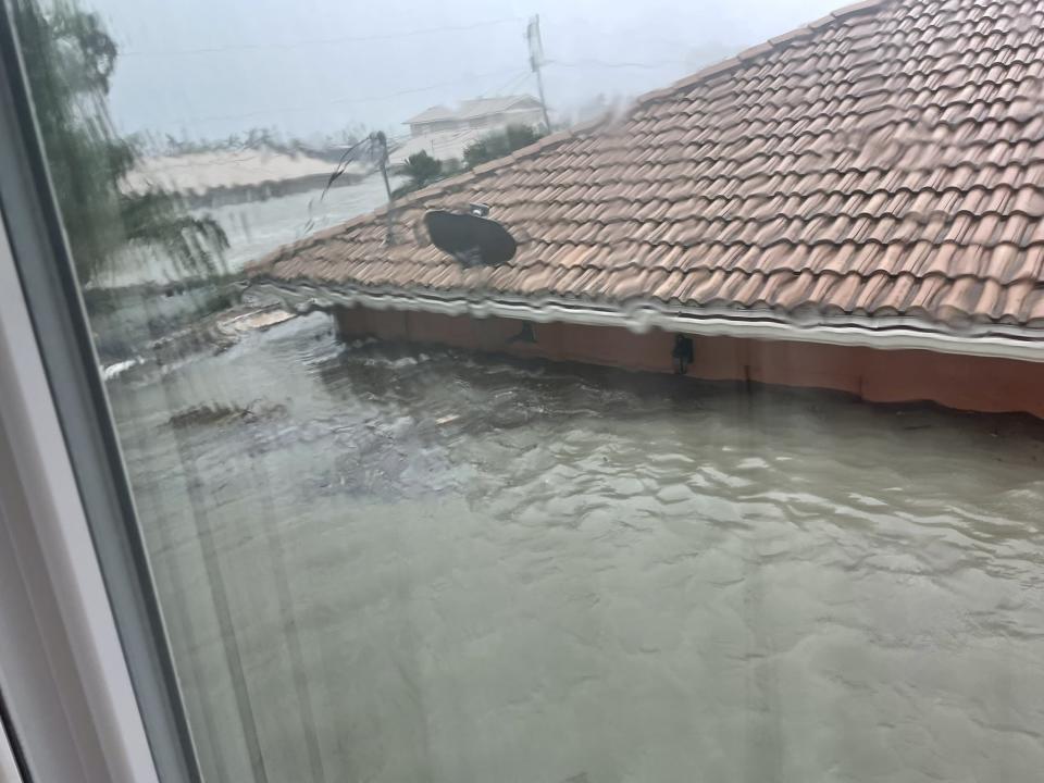 Major flooding up to the roof of a house