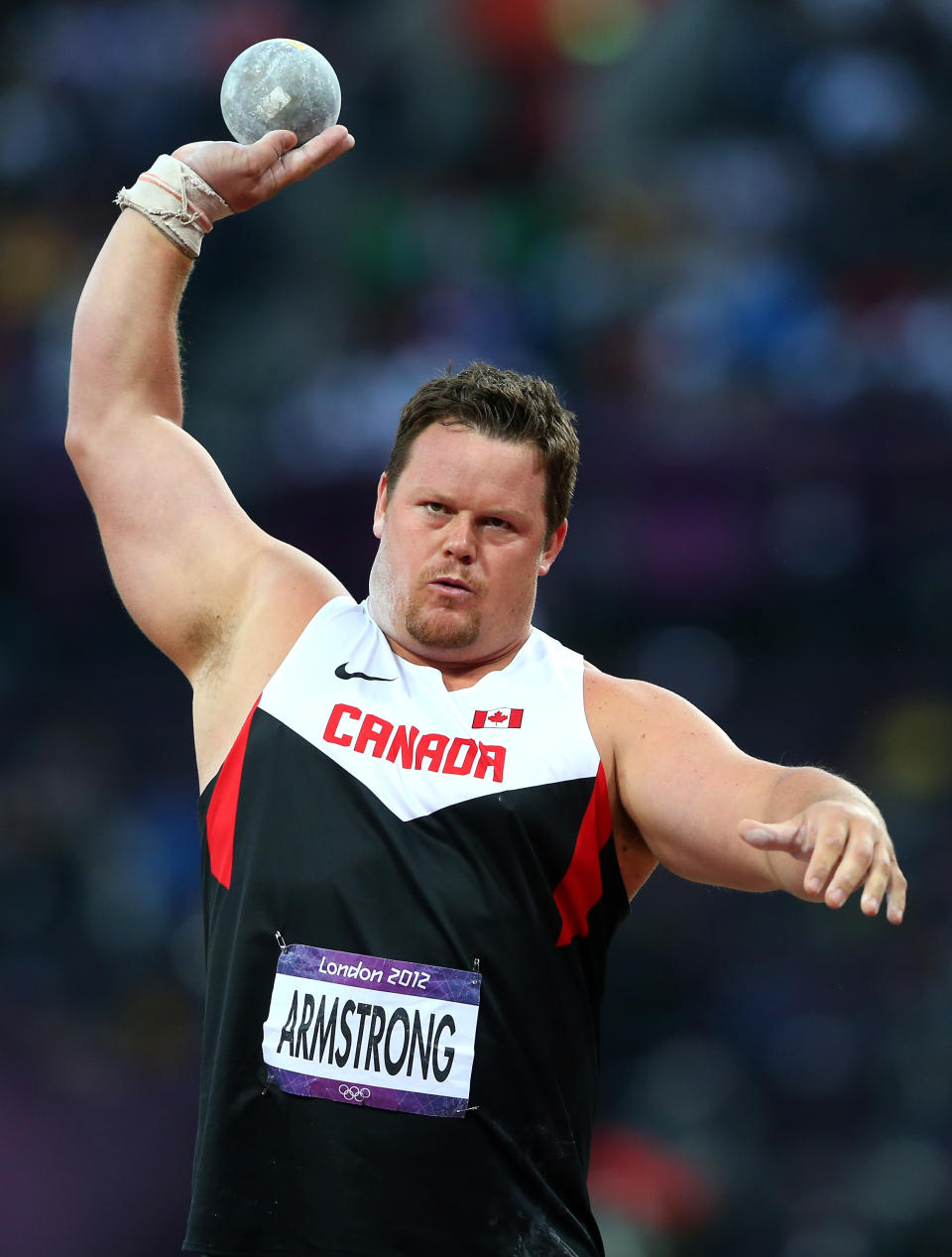 LONDON, ENGLAND - AUGUST 03: Dylan Armstrong of Canada competes in the Men's Shot Put Final on Day 7 of the London 2012 Olympic Games at Olympic Stadium on August 3, 2012 in London, England. (Photo by Alexander Hassenstein/Getty Images)